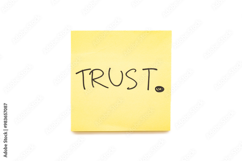 Hand writing Text TRUST on yellow sticky note with Clipping path isolate on white background. Financial and business concept. Marketing. Brand building. Hand writing Text TRUST on yellow sticky note with Clipping path isolate on white background. Financial and business concept. Marketing. Brand building.