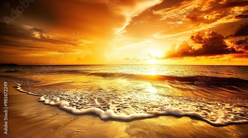 A beautiful beach under the natural sunset sky. The sand on the beach is golden, stretching out towards the ocean photo