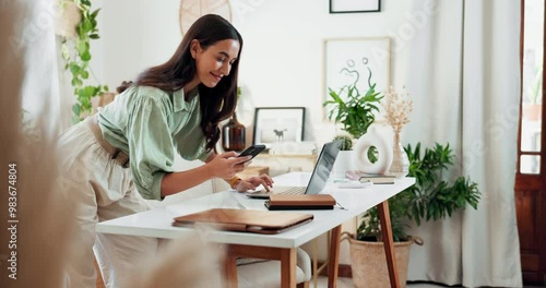 Woman, phone and laptop with plants in office for blog post review, checking magazine article and garden writer. Eco friendly small business, tech and happy for web story on biodiversity conservation