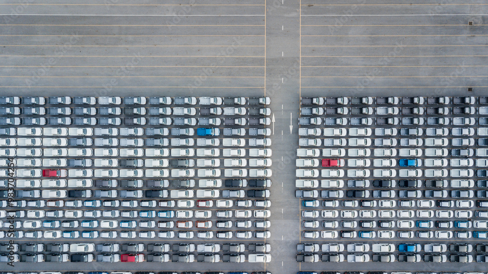 Aerial view new cars lined up in the port for import and export, Top view of new cars lined up automobile factory global logistic import export, New cars logistic to dealership for sale. Aerial view new cars lined up in the port for import and export, Top view of new cars lined up automobile factory global logistic import export, New cars logistic to dealership for sale.