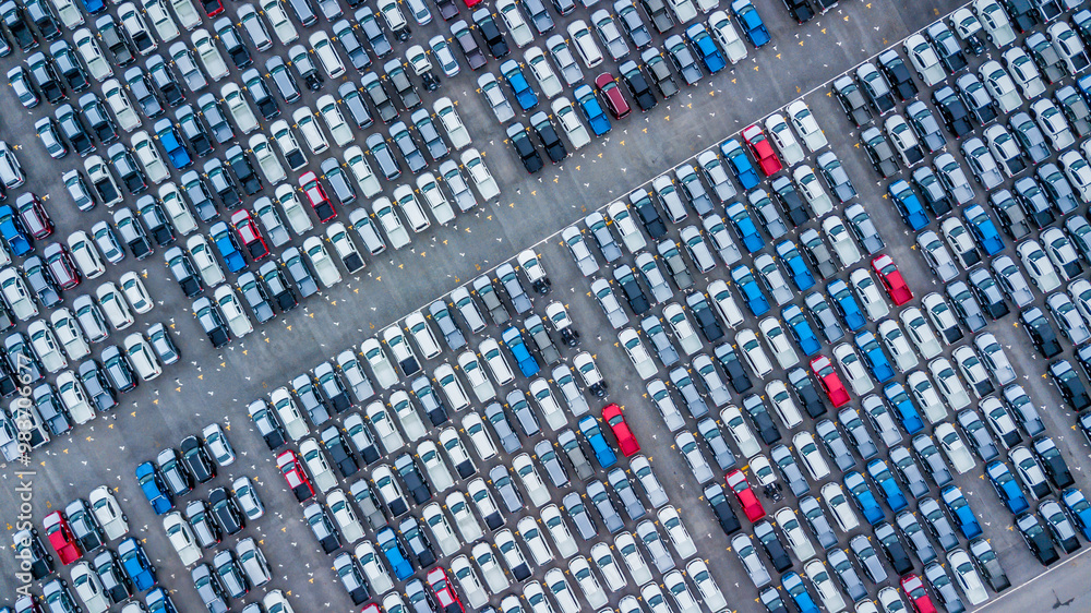 Aerial view new cars lined up in the port for import and export, Top view of new cars lined up automobile factory global logistic import export, New cars logistic to dealership for sale.