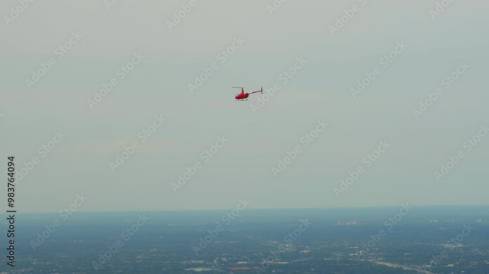 News helicopter hovering over city for the news. News helicopter hovering over city for the news.