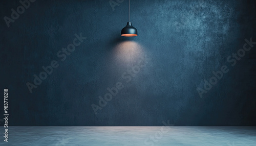 A minimalist interior featuring a dark wall and a hanging lamp, creating a moody ambiance perfect for modern design concepts.