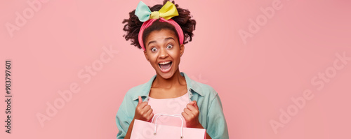 Excited Young Woman Holding Shopping Bag