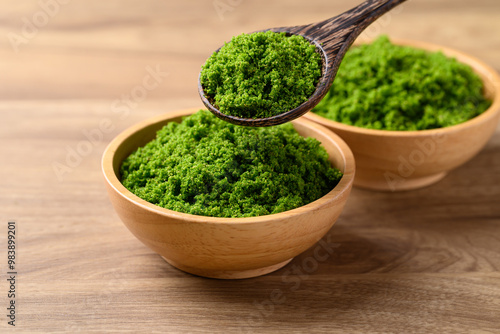Bild auf Leinwand Wolffia or watermeal in bowl with spoon, Edible small aquatic plant high protein