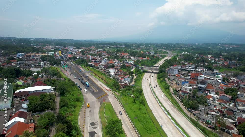 Aerial Views of the Highway Intersection in Suburban Area of A City in Asia Aerial Views of the Highway Intersection in Suburban Area of A City in Asia