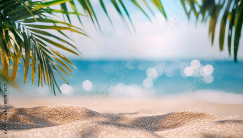 Fototapeta Naklejka Na Ścianę i Meble -  Blurred ocean waves with palm trees casting shadow on sandy beach