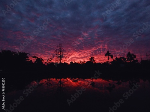 Landono-Indonesia, 19 Septmber 2024: evening sky view with red sun rays 