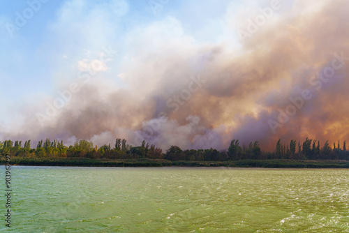 Quadro em tela landscape fire on the river bank