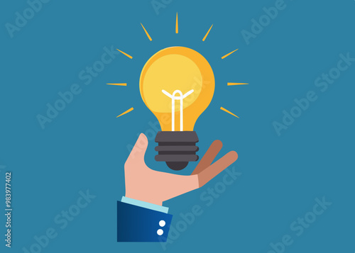 A hand holding a bright light bulb that represents innovation and creativity. This image title reflects the idea of ​​a light bulb symbolizing ideas, with elements such as creativity.