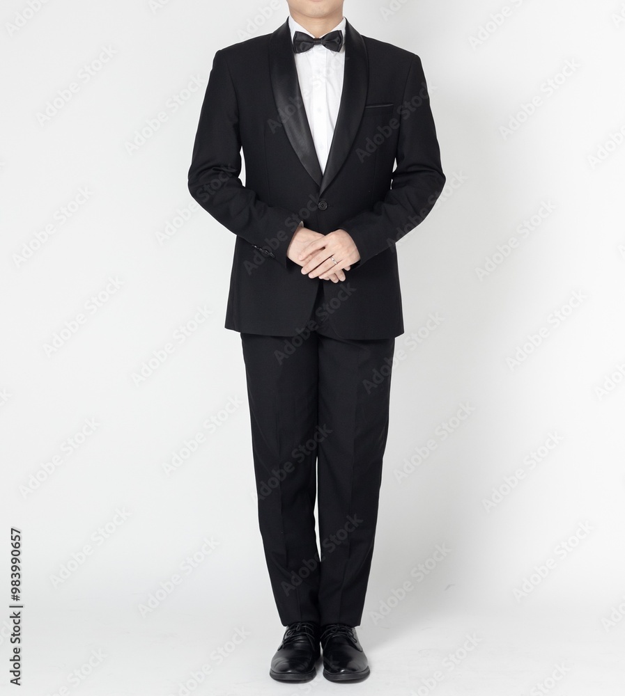 The man in black suit , the man in tuxedo suit The man in black suit , the man in tuxedo suit