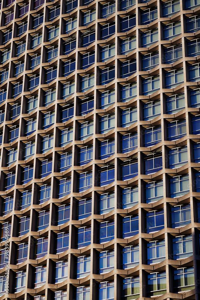 1960s modernism: post-war skyscraper; architectural symmetry, brutalist design, Centre Point skyscraper facade at Tottenham Court Road, Oxford Street, London UK, an iconic brutalist skyscraper 1960s modernism: post-war skyscraper; architectural symmetry, brutalist design, Centre Point skyscraper facade at Tottenham Court Road, Oxford Street, London UK, an iconic brutalist skyscraper