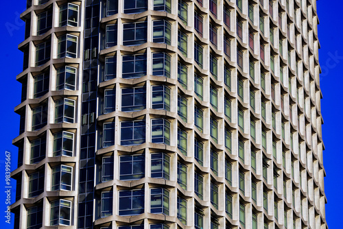 1960s modernism: post-war skyscraper; architectural symmetry, brutalist design, Centre Point skyscraper facade at Tottenham Court Road, Oxford Street, London UK, an iconic brutalist skyscraper photo