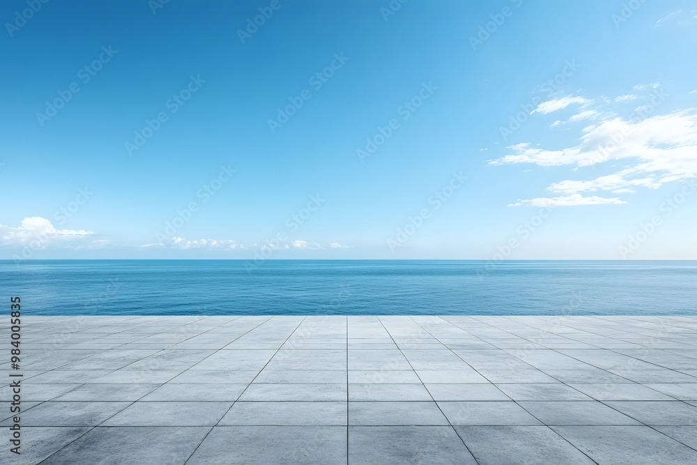 Fototapeta premium Blue sky with empty concrete floor and sea view. Vibrant banner with space for copy. Horizontal image of a calm ocean and clear sky. Ideal for promotional use