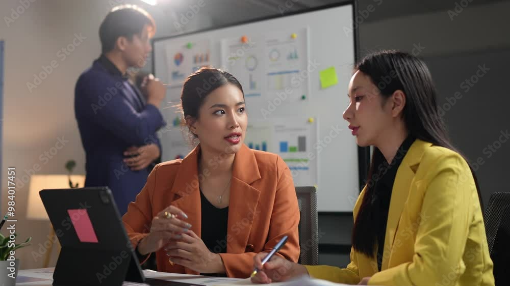 Asian office team brainstorming, planning for group problem solving ...