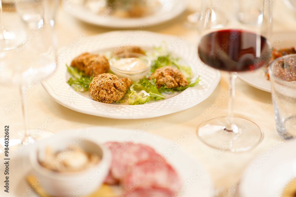 Close up on italian traditional northern food on a restaurant table. Many dishes are visible. Close up on italian traditional northern food on a restaurant table. Many dishes are visible.
