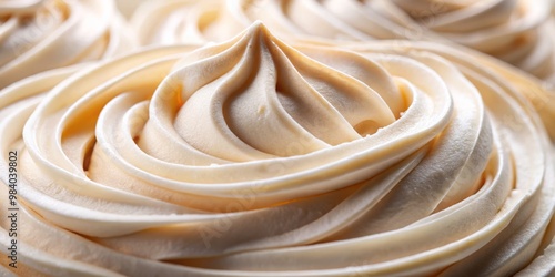 Close-Up of Fluffy Whipped Cream Swirl Glossy White Texture with Light Yellow Hues; Intricate Details and Soft, Inviting Composition Evoking Sweetness and Indulgence