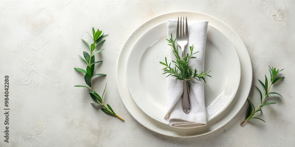 Elegant Minimalist Table Setting Symmetrical White Plates, Silver Fork, and Fresh Green Rosemary on Textured Background, Soft Lighting for a Clean, Inviting Atmosphere Elegant Minimalist Table Setting Symmetrical White Plates, Silver Fork, and Fresh Green Rosemary on Textured Background, Soft Lighting for a Clean, Inviting Atmosphere