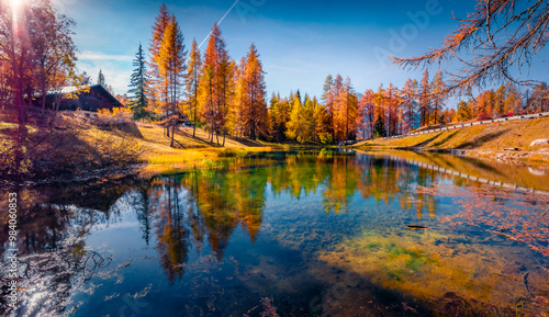 Astonishing autumn view of Scin lake. Wonderful morning scene of outskirts of Cortina d'Ampezzo town, Province of Belluno, Italy, Europe. Colorful landscape of Dolomite Alps. Travel the world..