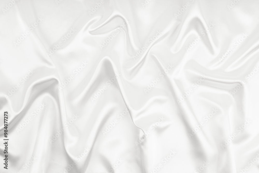 Obraz premium Abstract white fabric texture background. Cloth soft wave. Creases of satin, silk.