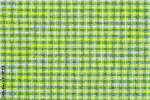 Checkered tablecloth for the table in green and white cells. Background texture of olive textile.