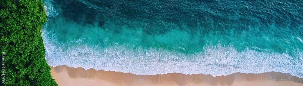 Aerial view of a beautiful tropical beach with turquoise water, sandy shore, and lush green forest. Perfect for travel and nature backgrounds. Aerial view of a beautiful tropical beach with turquoise water, sandy shore, and lush green forest. Perfect for travel and nature backgrounds.