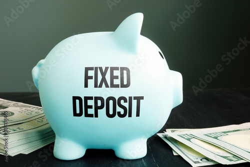 Fixed deposit is shown as business and financial concept photo