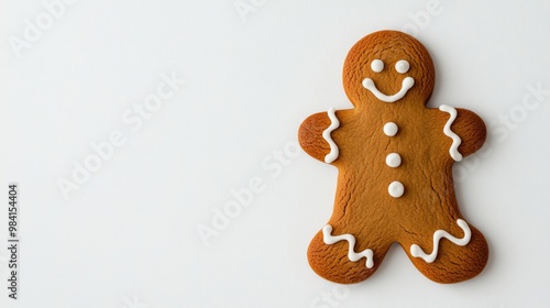 Minimalist shot of a single undecorated gingerbread cookie, isolated on a white background with clean lines and empty space 