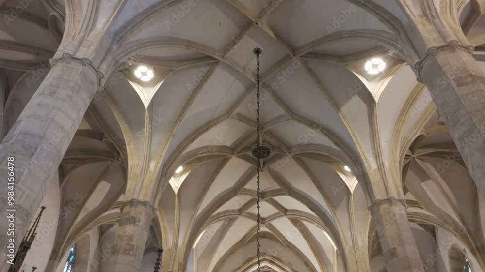 Interior overview of St. Martin's Cathedral in Bratislava, Slovakia, showcasing its Gothic architectural details Interior overview of St. Martin's Cathedral in Bratislava, Slovakia, showcasing its Gothic architectural details