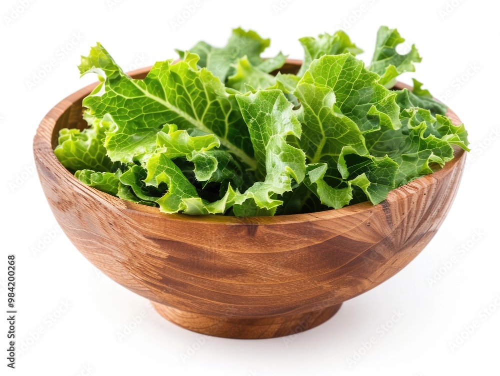 Lettuce Bowl. Fresh Green Salad Leaf in Wooden Bowl Isolated on White Background Lettuce Bowl. Fresh Green Salad Leaf in Wooden Bowl Isolated on White Background