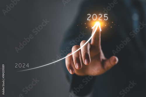 2025 growth business, Businessman analyzing economic trend data for long-term investment in 2025. Set up objective target business cost and budget planning for new year concept photo