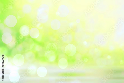 Abstract blurred fresh vivid spring summer light delicate pastel yellow green white bokeh background texture with bright circular soft color lights. Beautiful backdrop illustration.