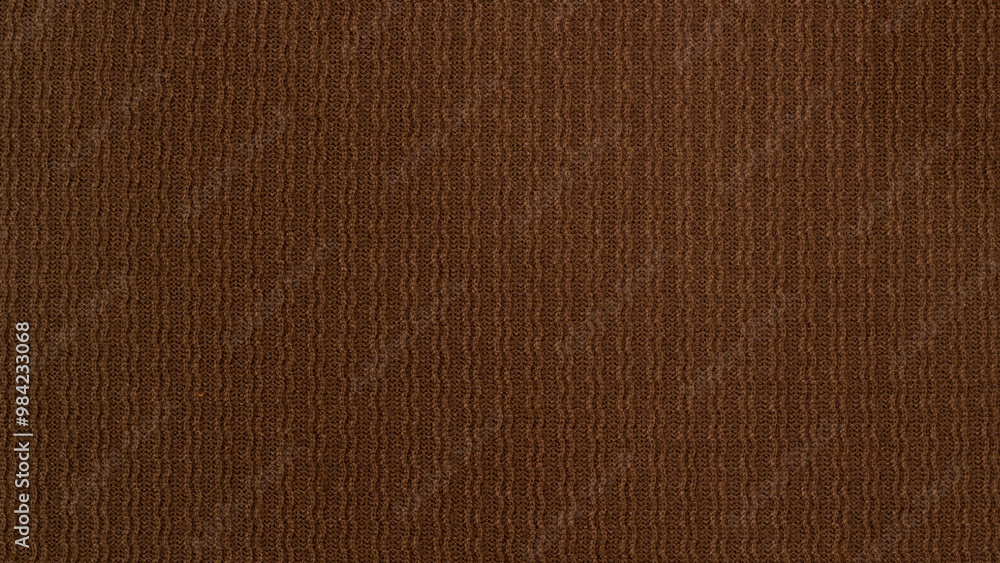 Texture of knitted fabric. Textile brown. Background for your project Texture of knitted fabric. Textile brown. Background for your project