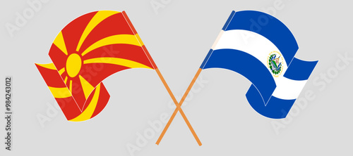 Crossed and waving flags of North Macedonia and Republic of El Salvador. Vector illustration