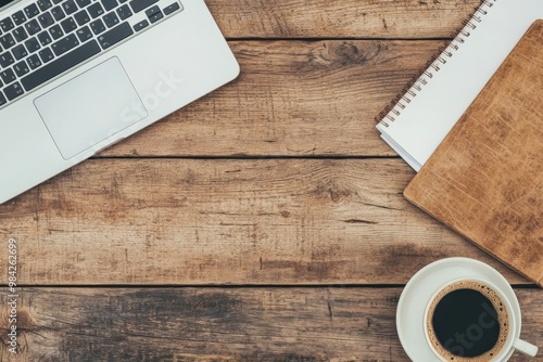 A workspace scene featuring a laptop, notebook, and a cup of coffee on a rustic wooden surface, ideal for productivity and creative thinking, Business idea concept.