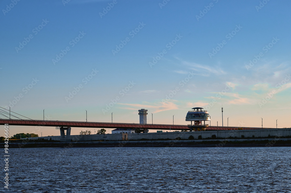 Part of the bridge across the Amur River between Russia and China. Observation tower in the form of a ball on the bank of China. Development of tourism and trade in the Far East. Part of the bridge across the Amur River between Russia and China. Observation tower in the form of a ball on the bank of China. Development of tourism and trade in the Far East.