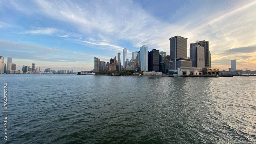 New York City - SEP 13 2023:
Downtown New York skyline panorama viewed from a boat sailing the Upper Bay New York City - SEP 13 2023:
Downtown New York skyline panorama viewed from a boat sailing the Upper Bay