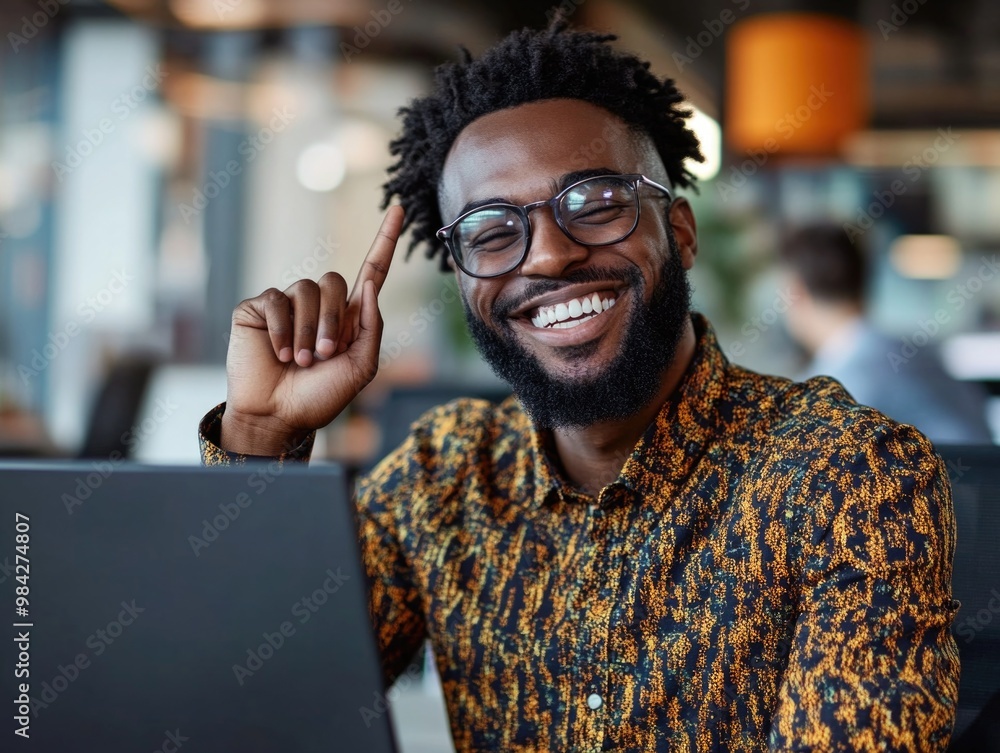 Happy Black Man Celebrating Success at Work Happy Black Man Celebrating Success at Work