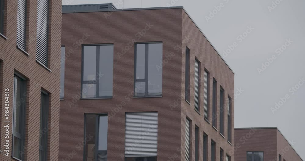 Modern brick office building exterior on an overcast day Modern brick office building exterior on an overcast day