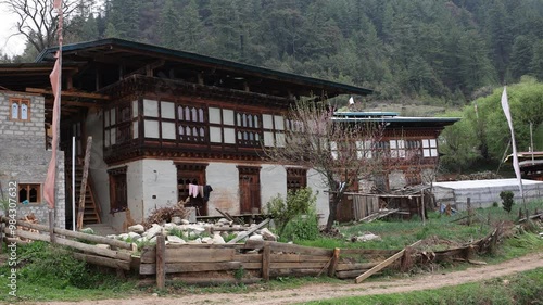 Bhutanese traditional house at rural area, Bumthang, Ogyen Choling, Bhutan photo