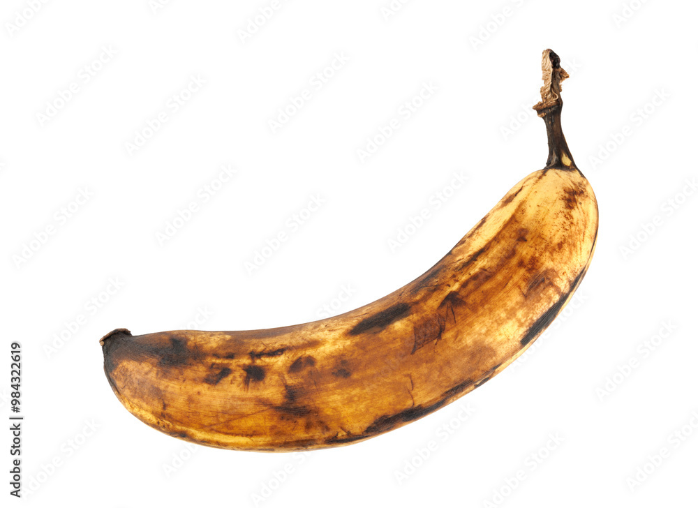 Darkened overripe bananas isolated on a white background. Blackened banana peel. Spoiled banana. Darkened overripe bananas isolated on a white background. Blackened banana peel. Spoiled banana.