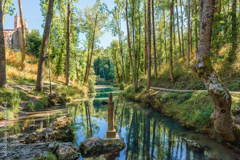 Fontibre, Spain. Landscape showcasing the birthplace of the River Ebro in the summer season Fontibre, Spain. Landscape showcasing the birthplace of the River Ebro in the summer season