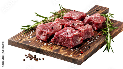 Fresh raw meat, including slices and cuts, with rosemary and pepper on a wooden board, isolated against a white background, showcasing the rich texture and ingredients