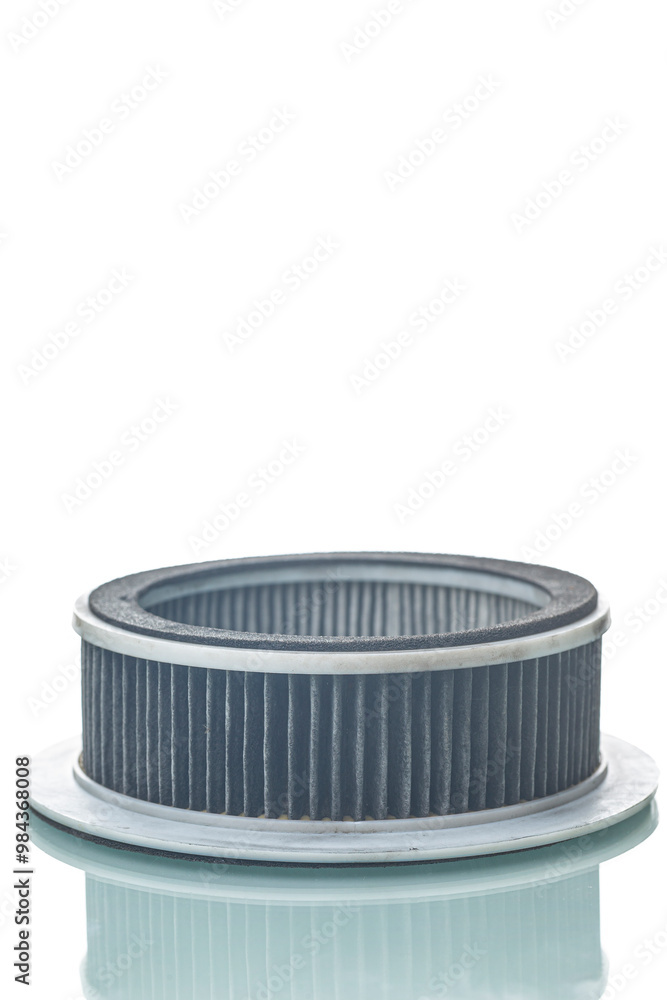 Automotive Concepts. Closeup View of Used Dirty Vehicle Engine Round Air Filter Isolated Over White Background Automotive Concepts. Closeup View of Used Dirty Vehicle Engine Round Air Filter Isolated Over White Background
