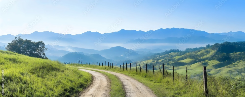 Fototapeta premium Scenic Hill Routes with Panoramic Mountain Views - Explore the Beauty of Curving Roads and Majestic Landscapes for Travelers and Adventure Enthusiasts