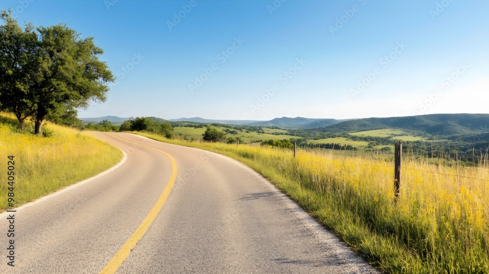 Fototapeta premium Scenic Hill Country Drive - Breathtaking Panoramic Views of Curving Hillside Routes and Serene Highland Landscapes