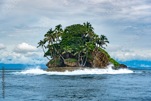 Tropical Paradise of Isla de los Pájaros, Panama, A Scenic Haven with Lush Vegetation, Wildlife, and Exotic Coastal Rock Formations in the Caribbean Sea photo