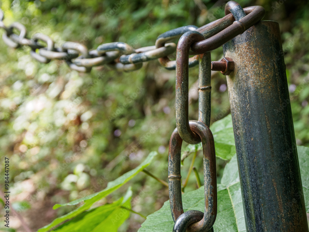 A close-up of a metal chain with a detailed texture that emphasizes strength and durability, ideal for industrial themes A close-up of a metal chain with a detailed texture that emphasizes strength and durability, ideal for industrial themes