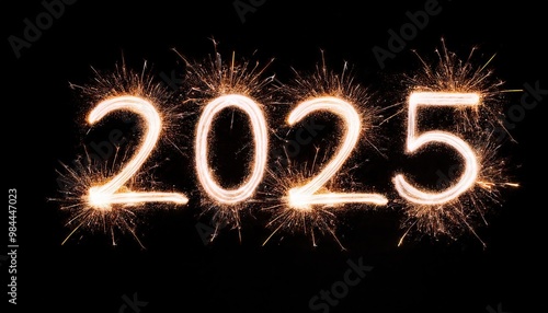 Sparkling Year 2025 painted with sparkles. Written on a black background