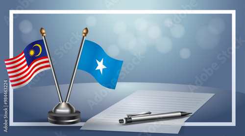Malaysia and Somalia Small national flag on bokeh background, cooperative relationship
